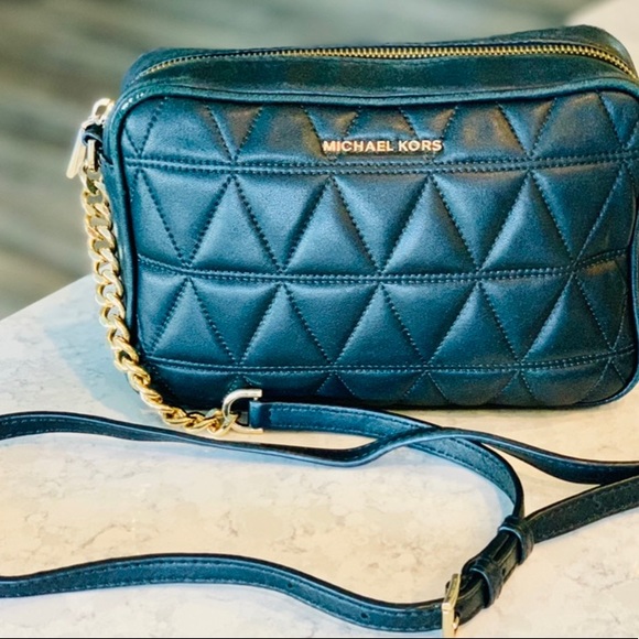 Michael Kors black small purse with gold link strap. Used. - Picture 1 of 7